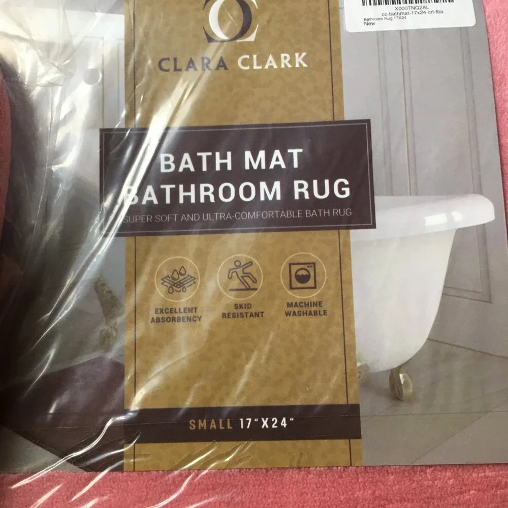 2 coral peach colored 17x24 bath mats. Matching Set - So Pretty